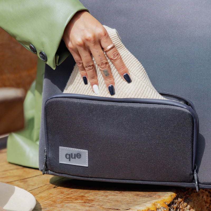 Reaching into the Totepack's front pocket